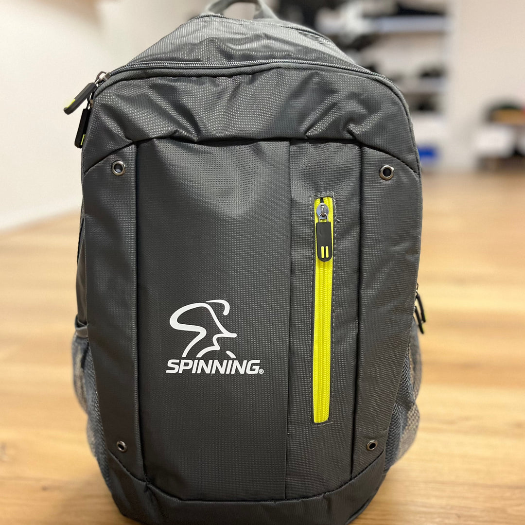 Spinning Backpack Grey with yellow zip detail
